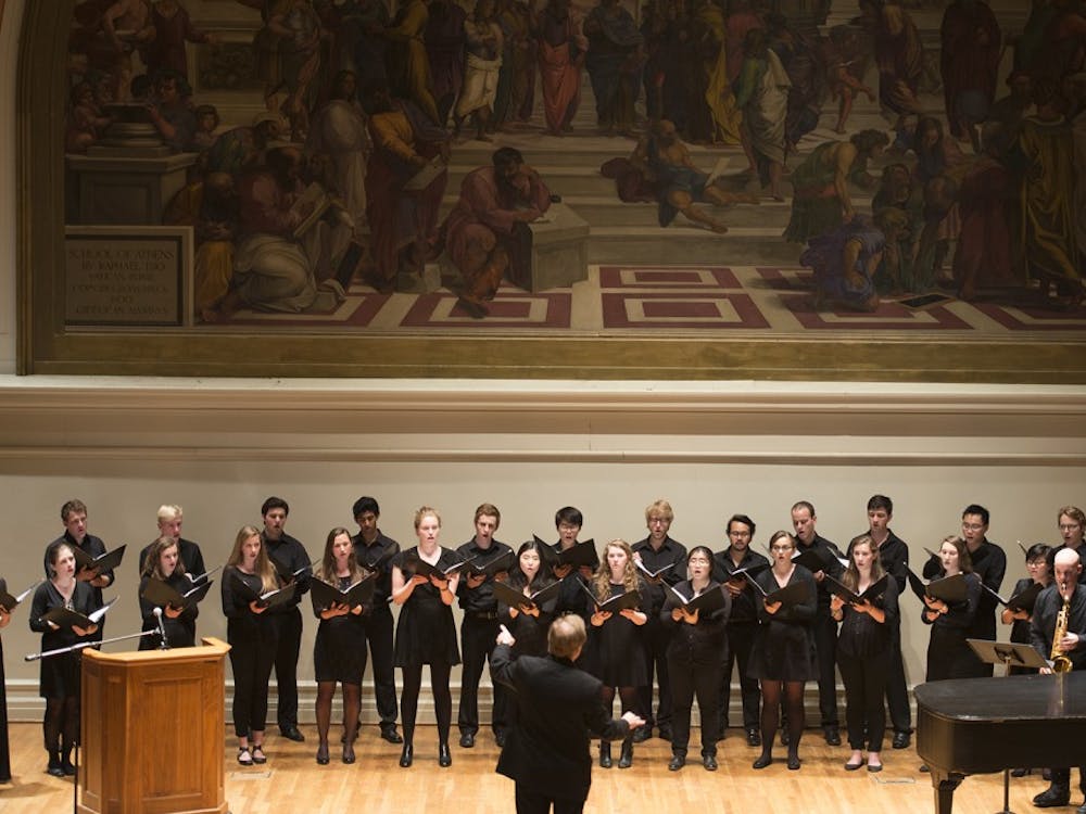 The University Chamber Singers opened the memorial.