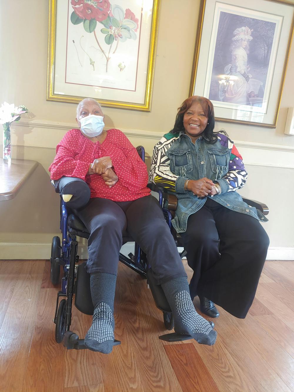 Wendy Cooper and her mother, an Alzheimer's patient, sitting together.