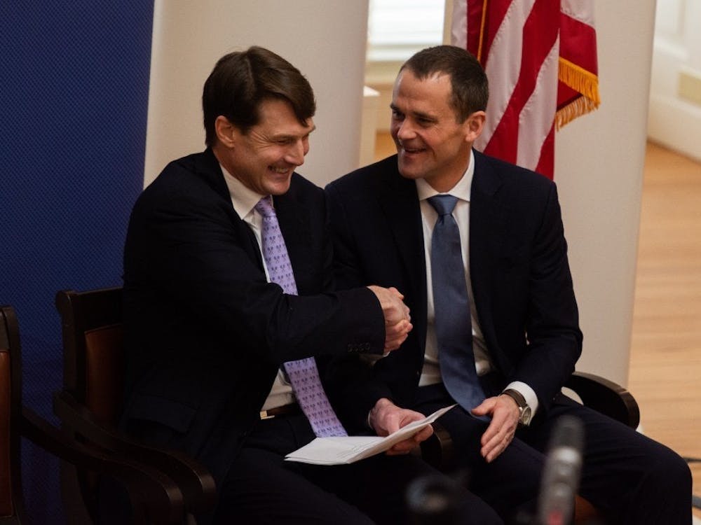 Pictured are Jaffray Woodriff (left), leader of the Quantitative Foundation and CEO of Quantitative Investment Management and University President Jim Ryan (right). 