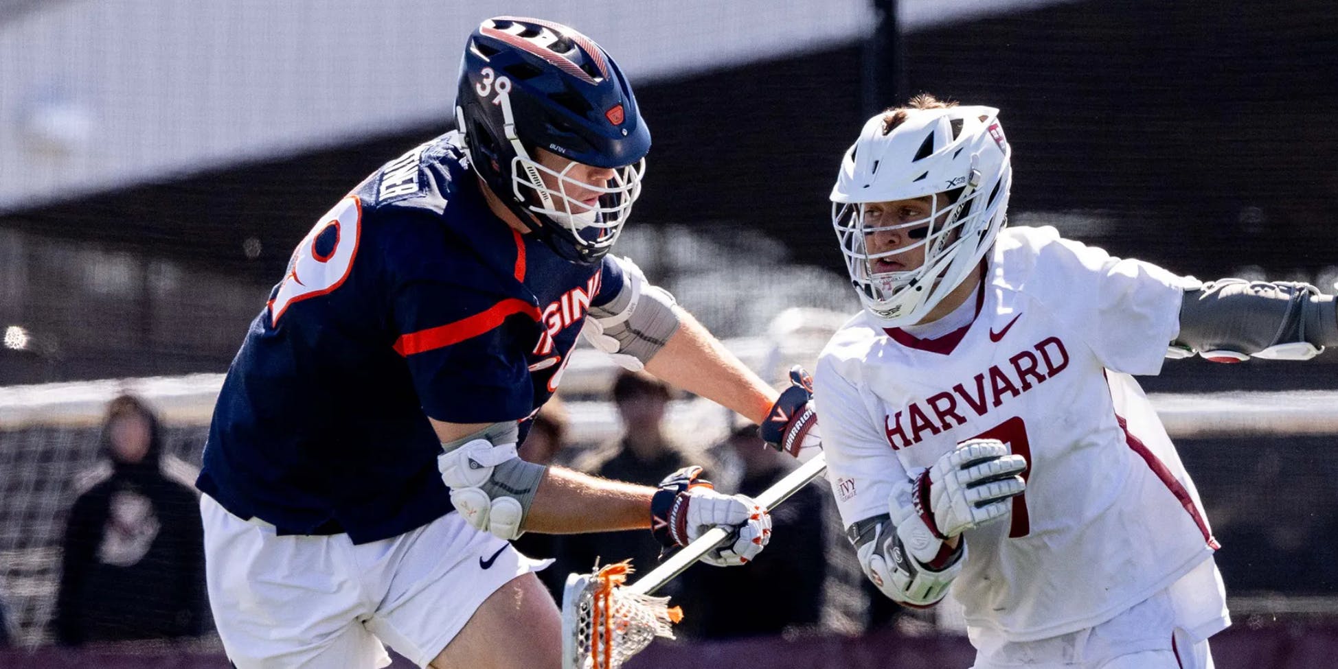 Senior defender Cole Kastner pushes a Harvard attacker
