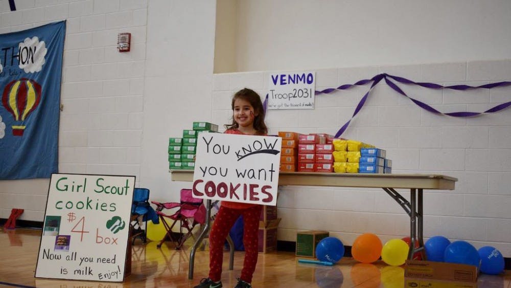 Olivia sold over 800 boxes of Girl Scout cookies in her attempt to sell the most in the Virginia Skyline Region.