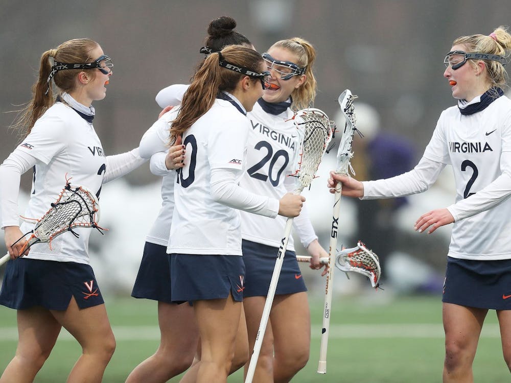 Although the Cavaliers allowed the Cardinals to storm back with a late 5-1 run a goal by freshman attacker Maggie Bostain sealed a Virginia win. 