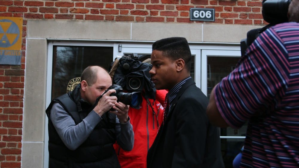 Third-year College student Martese Johnson exited the Charlottesville General District Court following the initial hearing regarding his arrest last Wednesday. Courtesy Dan Gettinger.