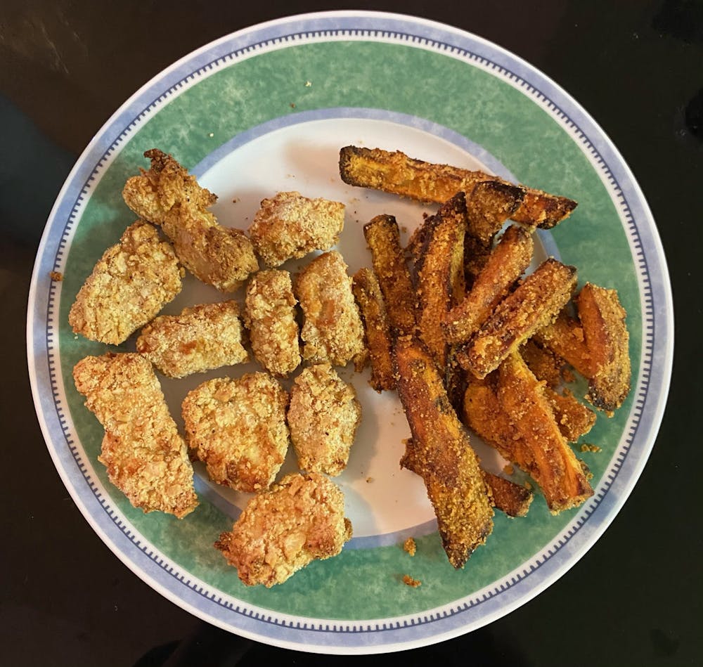 <p>Get out of your cooking funk and make this delicious and quick chicken nuggets and sweet potato fries meal. Thank you, air fryer!</p>