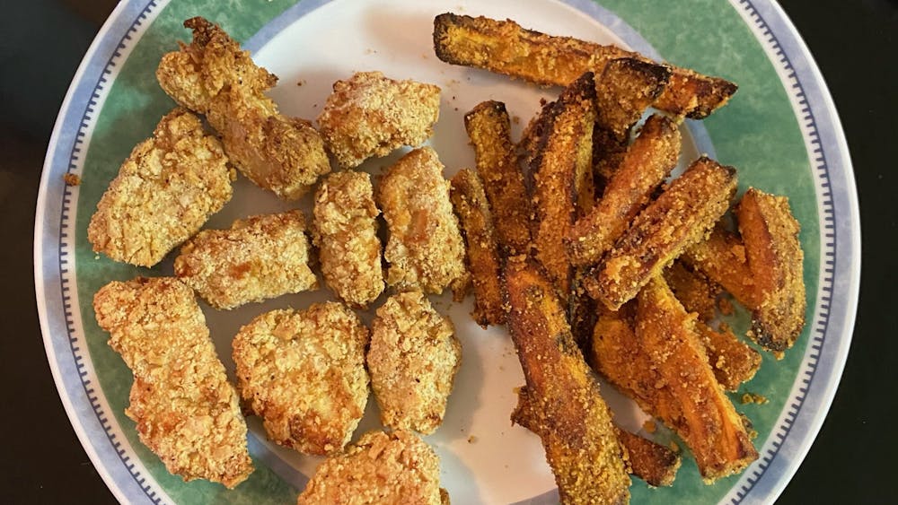 Get out of your cooking funk and make this delicious and quick chicken nuggets and sweet potato fries meal. Thank you, air fryer!