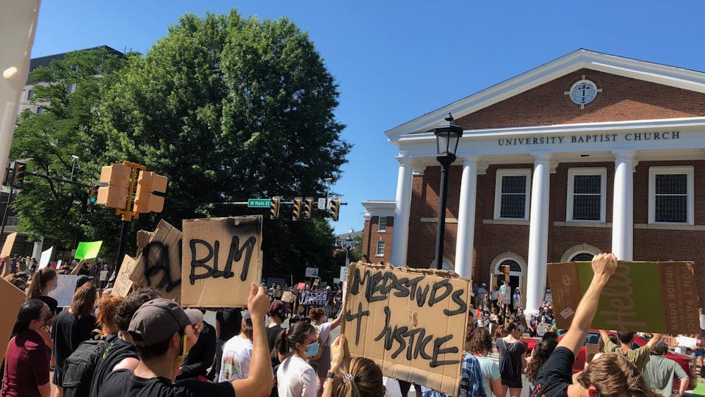 Protesters gathered in front of University Baptist Church around 4 p.m., where the march later ended with a series of speakers.