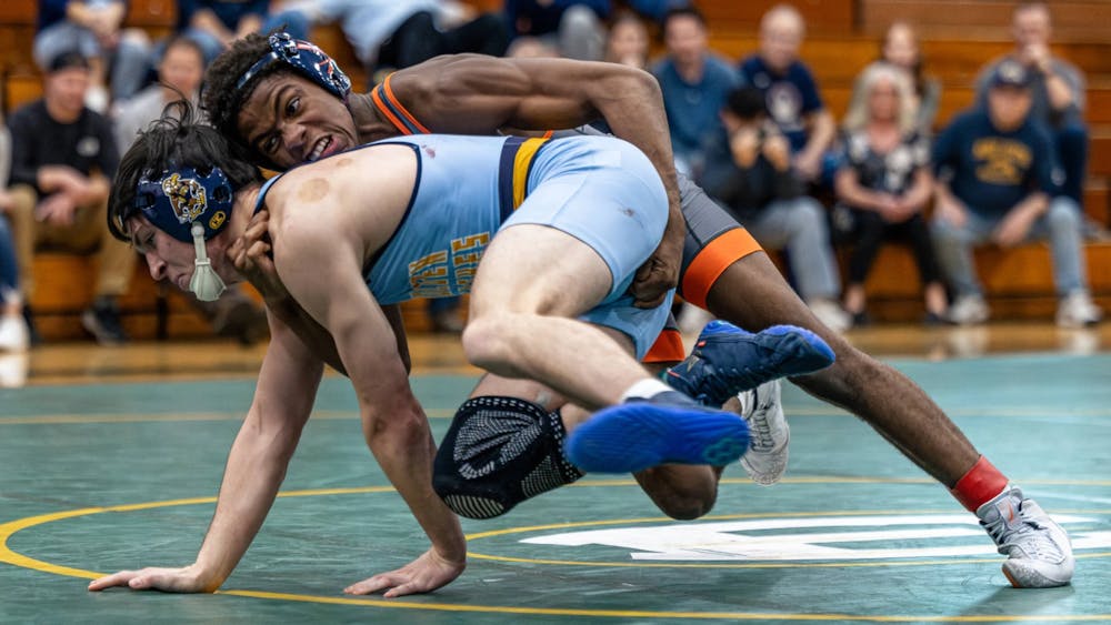 Dominance across the board propelled Virginia through two shutout duals.
