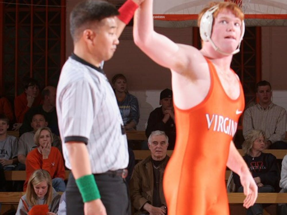 Brent Jones won the 197lb division by forfeit in the meet against UNC.  UVA outscored the Tar Heels 27-10.