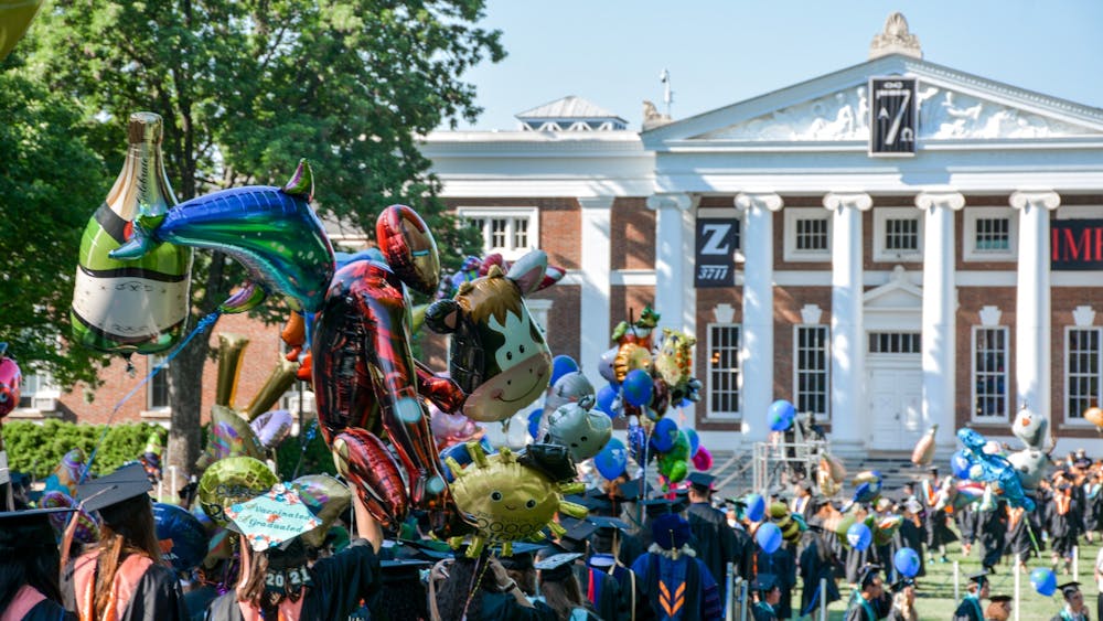 Adding to the fun is the unique tradition of carrying a balloon while you walk down the lawn at graduation.