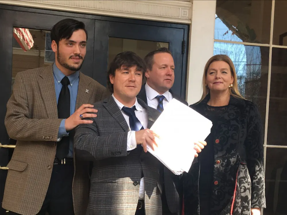 Kessler (center) could serve up to 12 months in jail, receive a maximum fine of $2,500 or both.