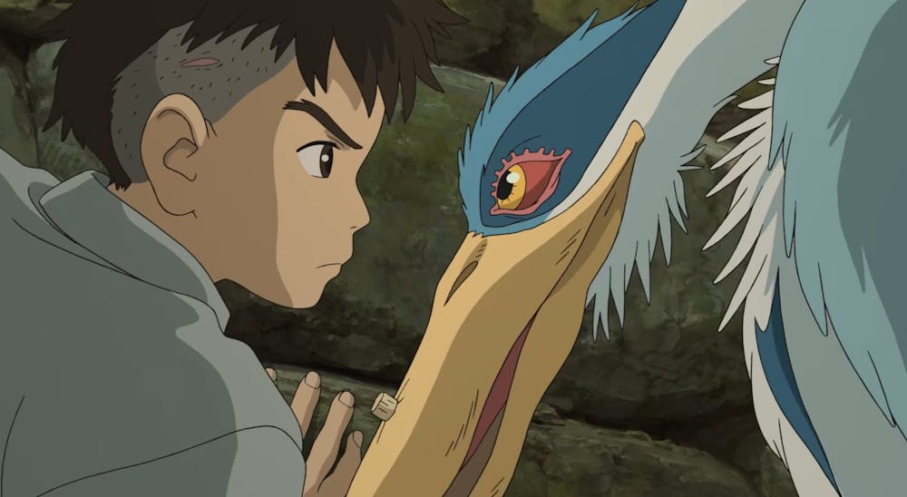 “The Boy and the Heron” follows a young protagonist named Mahito — voiced by Luca Padovan — in the wake of tragically losing his mother in a Tokyo fire during the Pacific Theater.  