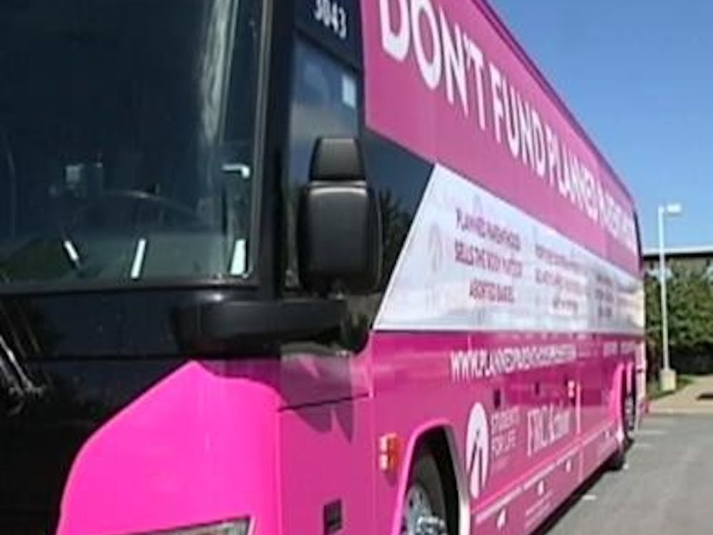 Small pink crosses were planted in the grass at the Amphitheater to represent the 897 abortions carried out by Planned Parenthood each day.