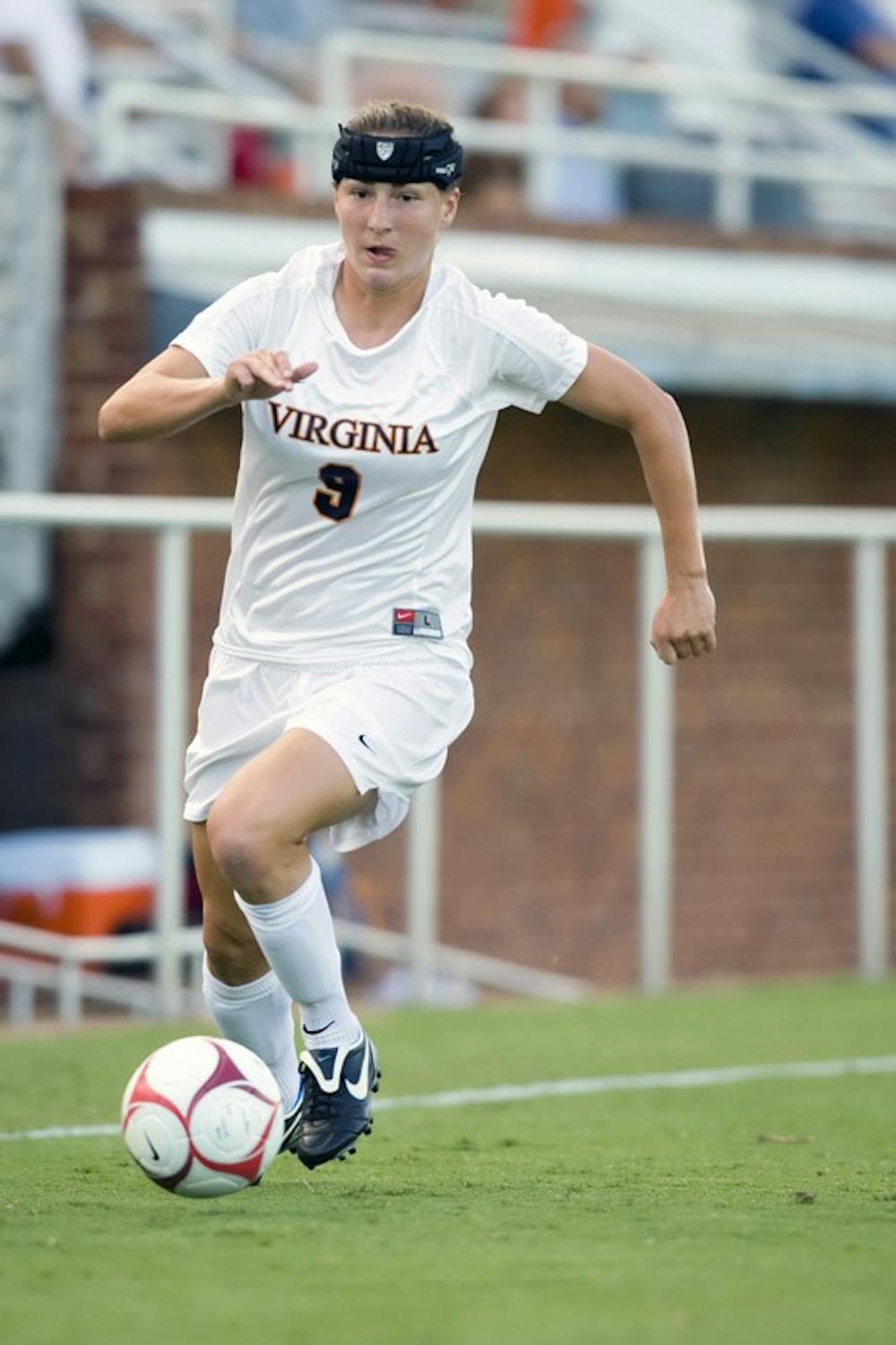 Virginia Cavaliers forward Lauren Alwine (9) in action against Loyola.  The #6 Virginia Cavaliers defeated the Loyola College Greyhounds 4-0 in a NCAA Women's Soccer game held at Klockner Stadium on the Grounds of the University of Virginia in Charlottesville, VA on August 22, 2008.
