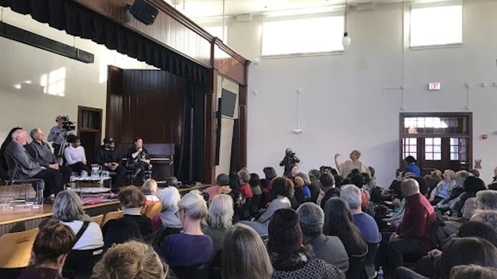  
An audience member challenged the panel with accusations that African American women from Charlottesville were not sufficiently represented. 