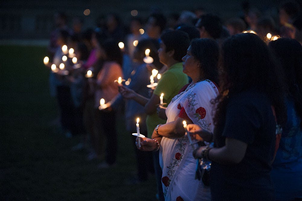 <p>Students, faculty and community members gathered in the amphitheater Sunday night to honor victims of the earthquake in Nepal and support those affected by the tragedy.</p>