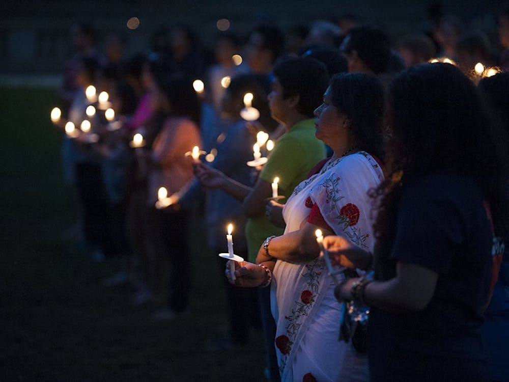 Students, faculty and community members gathered in the amphitheater Sunday night to honor victims of the earthquake in Nepal and support those affected by the tragedy.