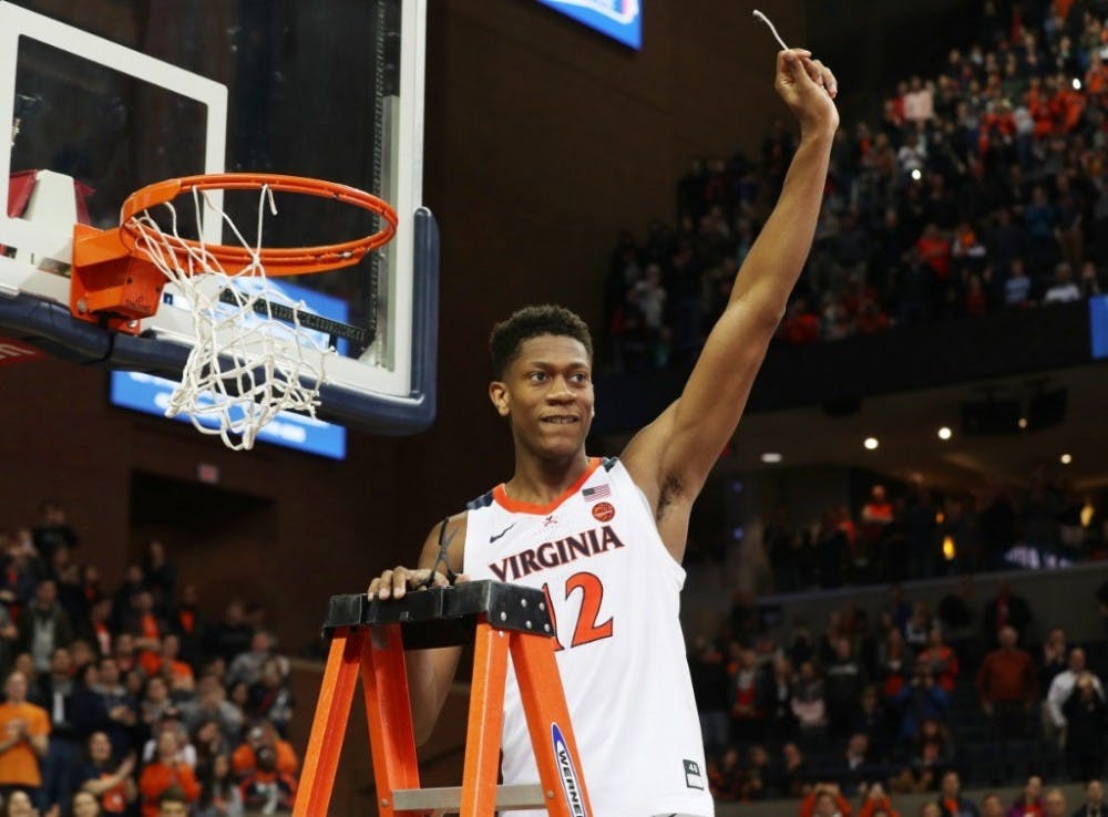 <p>Sophomore forward De'Andre Hunter will be key in helping the Cavaliers cut down the nets in March.</p>