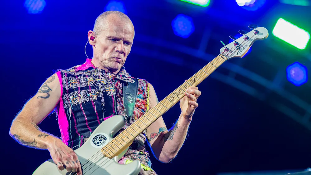 Flea gained fame as the bassist in the iconic Red Hot Chili Peppers, attracting notoriety for his signature slap-bass technique