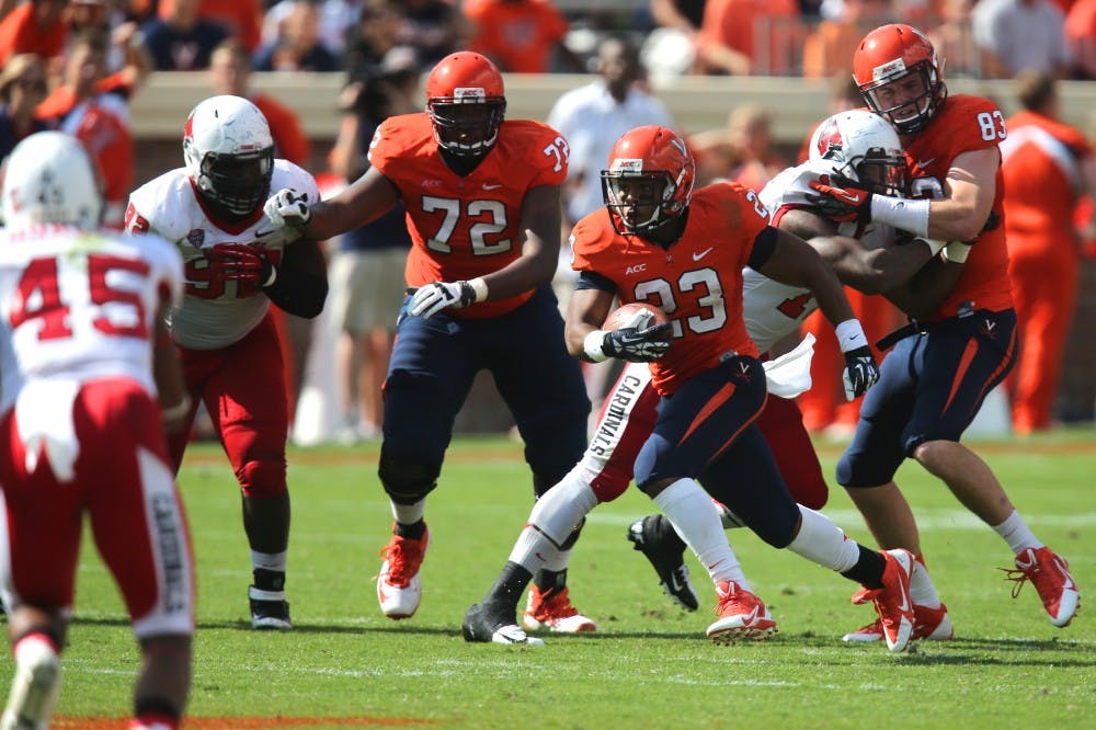 	Freshman Offensive Tackle Eric Smith (42) made his first career start on Saturday against the Ball State Cardinals. 