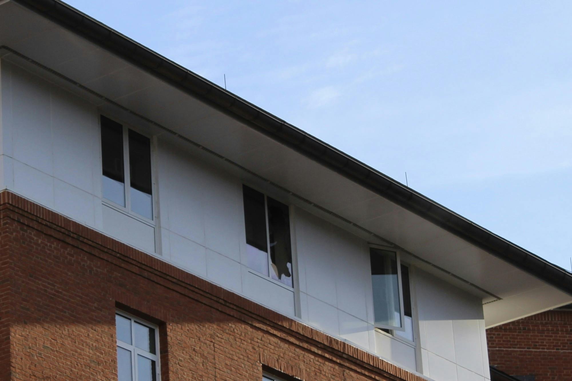 According to eyewitnesses, smoke could visibly be seen leaving the broken window. 