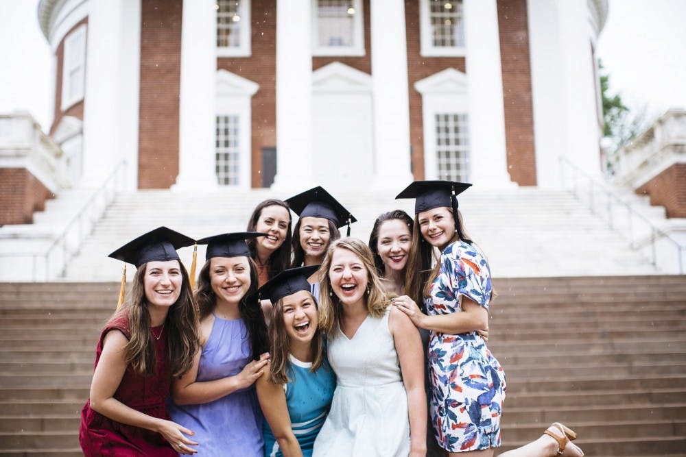 Student photographers and professional photographers like U.Va. graduate Brittany Fan meet the high demand for graduation photos every year.&nbsp;