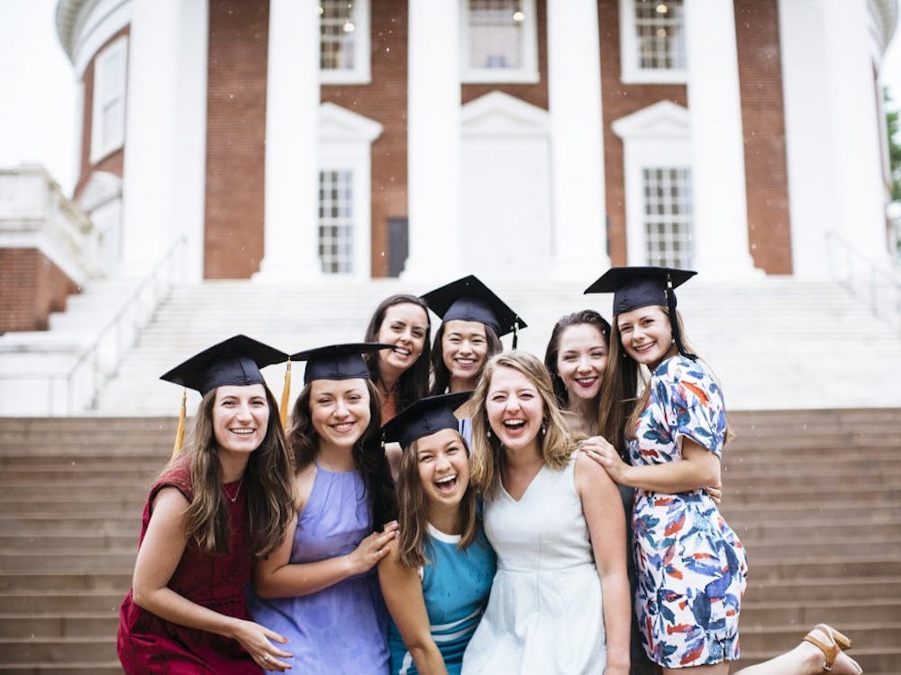 Student photographers and professional photographers like U.Va. graduate Brittany Fan meet the high demand for graduation photos every year. 