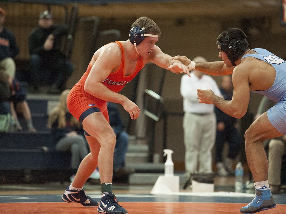 Redshirt freshman Garrett Peppelman defeated Chattanooga sophomore Justin Lampe in the 165 pound weight class with a 19-13 decision. Virginia could not hold off the comeback by the Mocs.