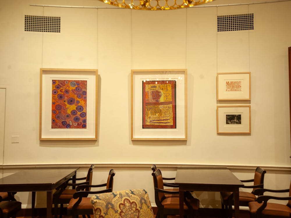 Most of the prints in the exhibition have a similar style, with vivid points of color combining and layering to create circles, planes and arc-like shapes.