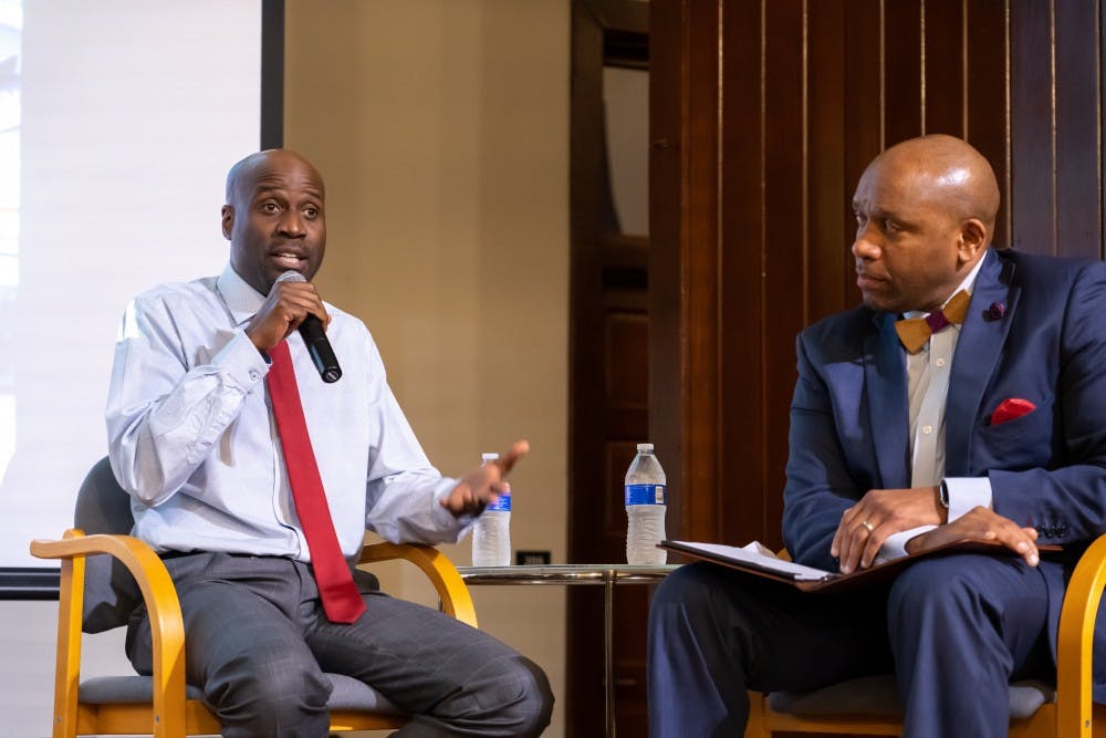 Artist Bayeté Ross Smith talks on Oct. 16 at the Jefferson School African American Heritage Center with Kevin MacDonald, the University's Vice President of Diversity, Equity and Inclusion.
