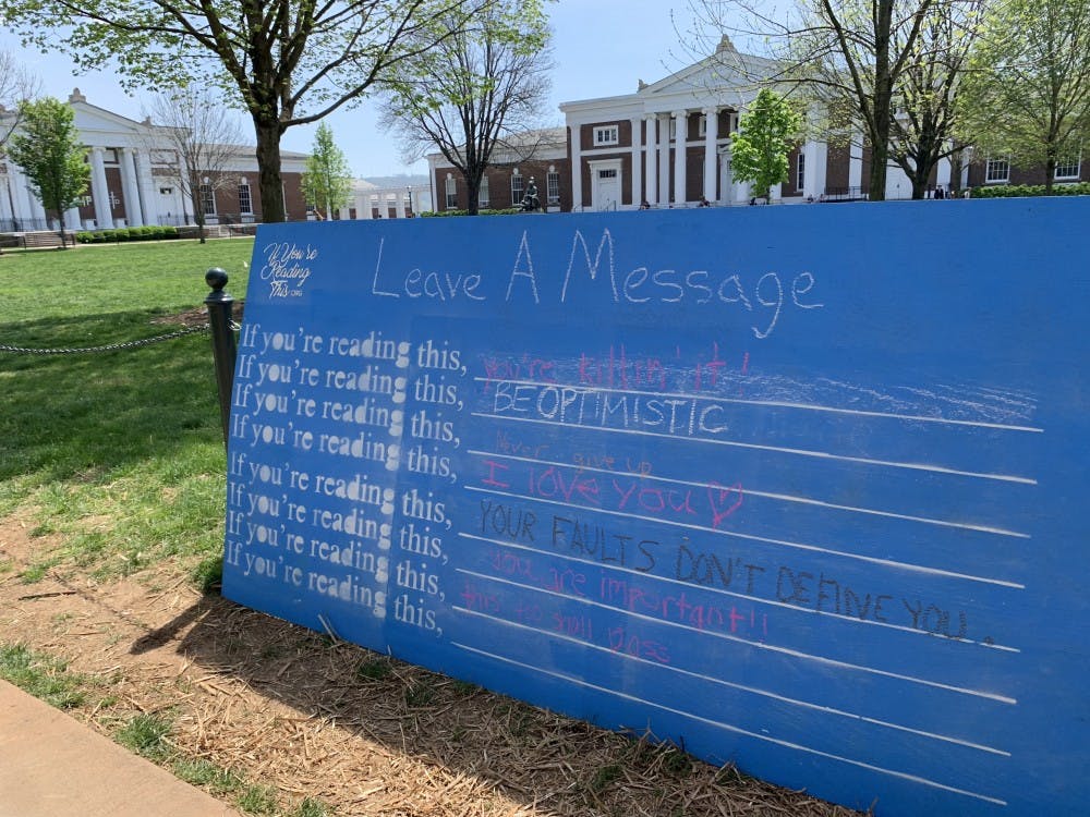 <p>If You're Reading This, a student-run mental health advocacy organization, set up an encouragement wall where students could write down messages of encouragement to others passing by as part of the Mental Health on the Lawn event.&nbsp;</p>