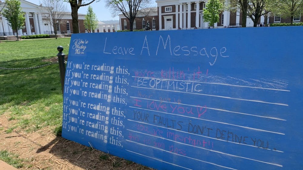 If You're Reading This, a student-run mental health advocacy organization, set up an encouragement wall where students could write down messages of encouragement to others passing by as part of the Mental Health on the Lawn event.&nbsp;