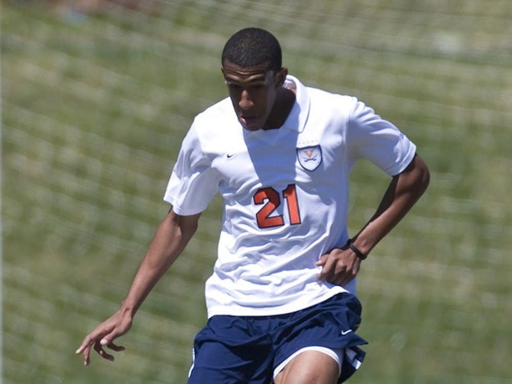 Virginia Cavaliers defender Shawn Barry (21).  The North Carolina State Wolfpack defeated the Virginia Cavaliers 1-0 in NCAA Men's Soccer during a spring scrimmage at the Klockner Stadium practice field on the Grounds of the University of Virginia in Charlottesville, VA on April 4, 2009.