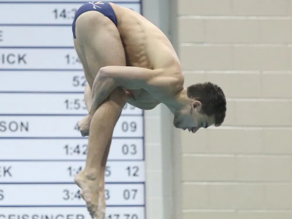 Senior diver JB Kolod took up diving after giving up gymnastics his sophomore year of high school. Now, he is the most accomplished diver in program history.