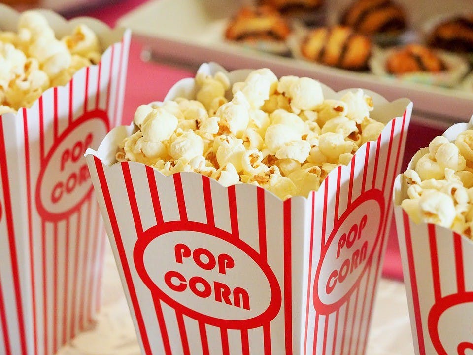 Theater popcorn can cost around $7, but buying a box of microwave popcorn at the store is much cheaper.&nbsp;