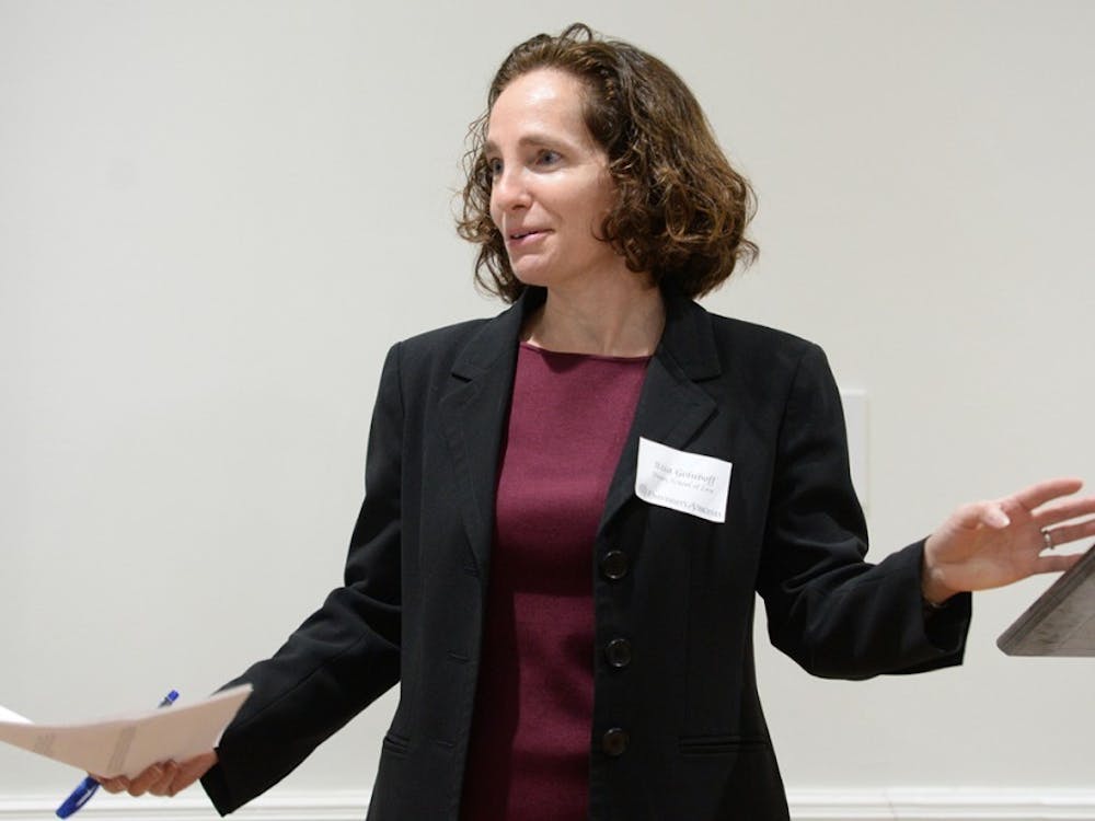 Law School Dean Risa Goluboff spoke about recent proposed policy regulations at a University Democrats meeting Wednesday night.
