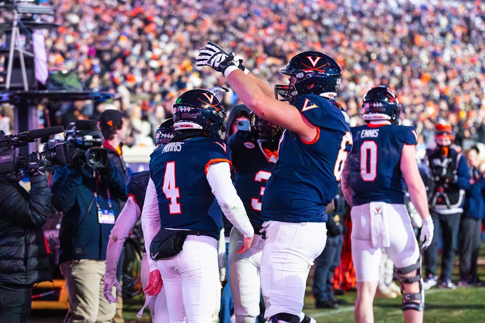 Morris and the Cavaliers celebrate a touchdown.