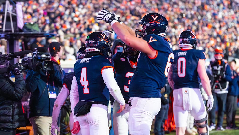 Morris and the Cavaliers celebrate a touchdown.