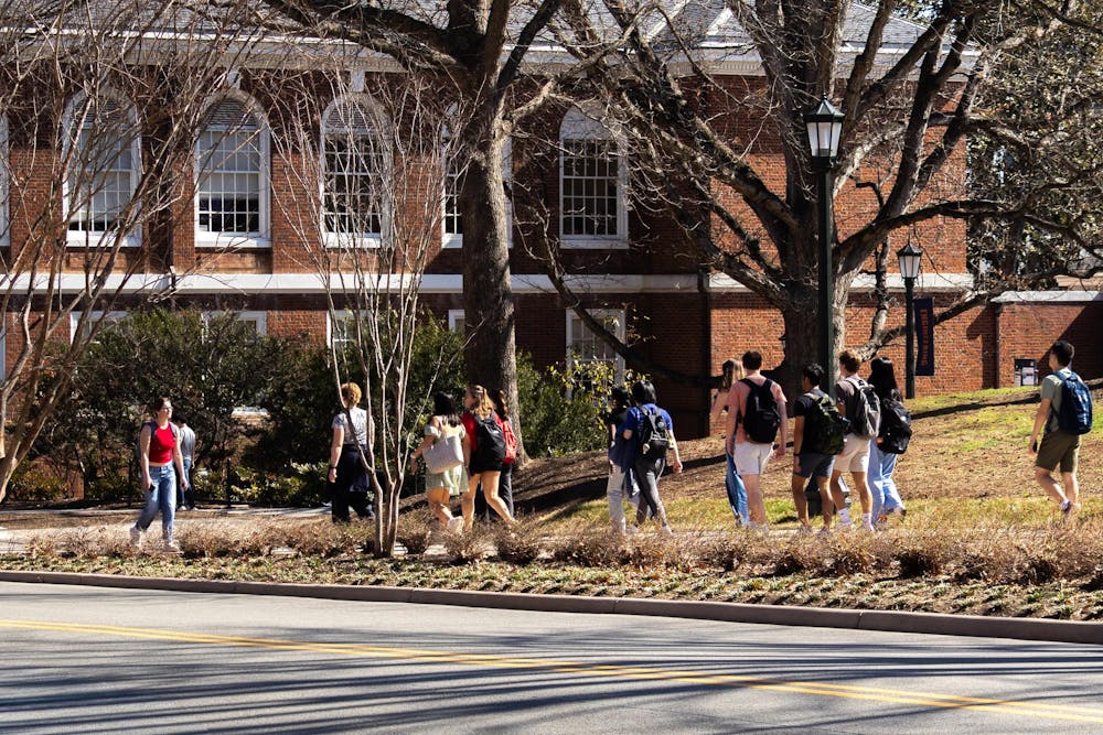 Students walking along McCormick Rd. 