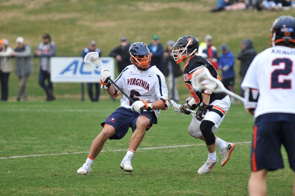 <p>Sophomore midfielder Dox Aitken scored a goal right before halftime to put the Cavaliers ahead by one, 5-4.</p>