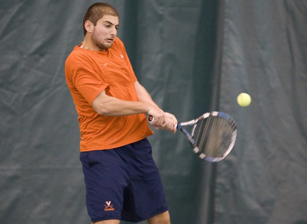 Michael Shabaz in action against Texas.  The #1 ranked Virginia Cavaliers men's tennis team defeated the #5 ranked Texas Longhorns 5-2 at the Boyd Tinsley Courts at the Boar's Head Inn and Resort in Charlottesville, VA on February 29, 2008.