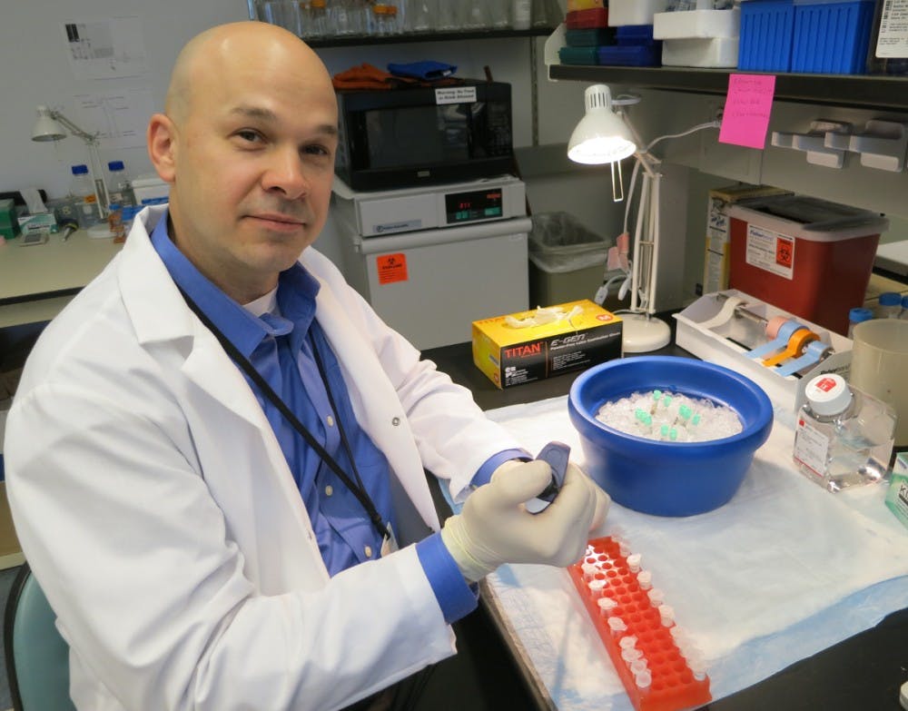 <p>Asst. Prof. of Medicine Charles Farber&nbsp;and his lab members at the Medical School’s Center for Public Health Genomics identified multiple genes likely to be connected to bone disease.</p>