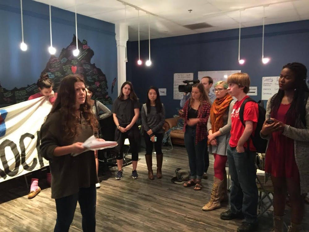 Students demonstrating at the Charlottesville Clinton office.&nbsp;