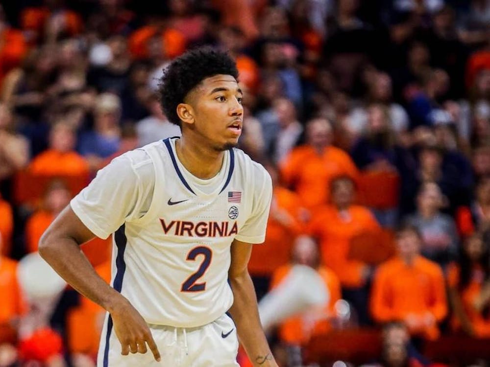 Reece Beekman leading Virginia during a game his senior season.