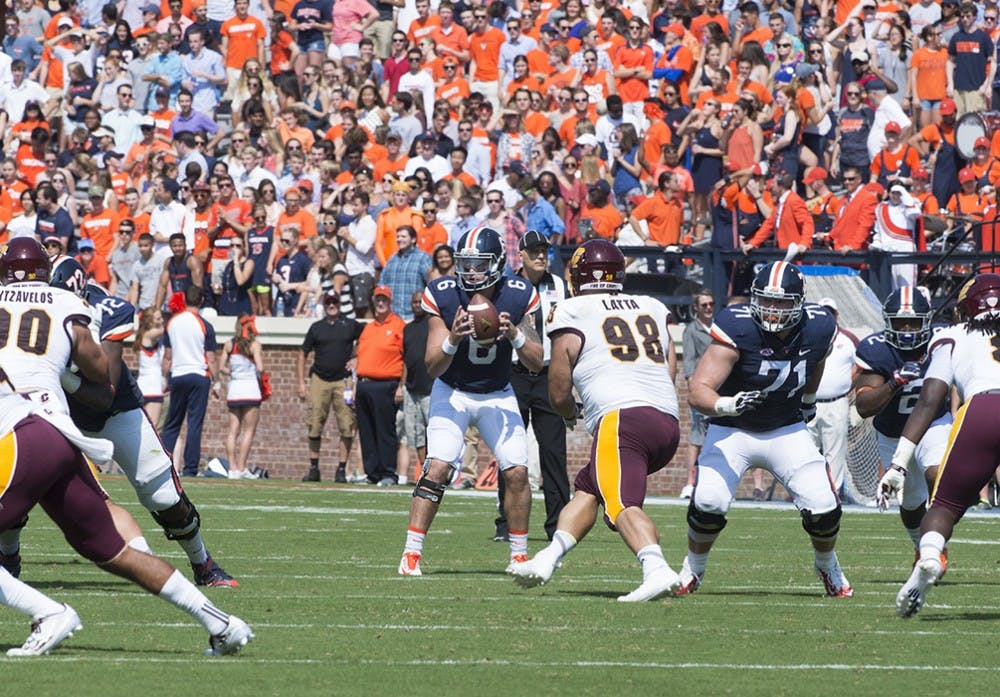 Junior quarterback Kurt Benkert broke Virginia's single-game passing record with 421 yards and five touchdowns.&nbsp;