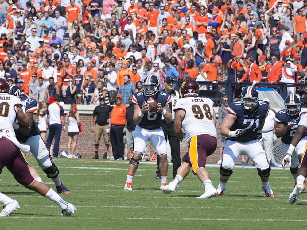 Junior quarterback Kurt Benkert broke Virginia's single-game passing record with 421 yards and five touchdowns. 