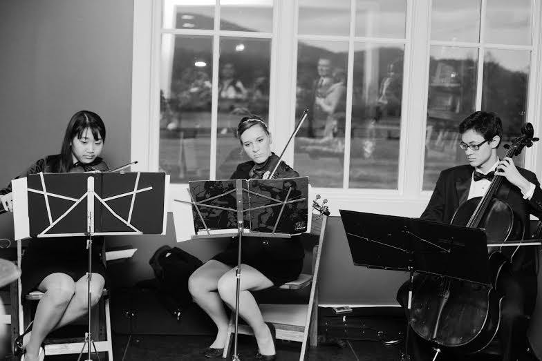 Volunteers with Musicians on Call play music and sing in the main hospital lobby and the Emily Couric Clinical Cancer Center. 