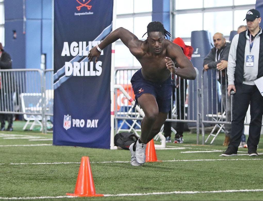 Graduate student tight end Jelani Woods put together impressive showings at the NFL Combine and Virginia Pro Day to boost his draft stock ahead of the NFL Draft.