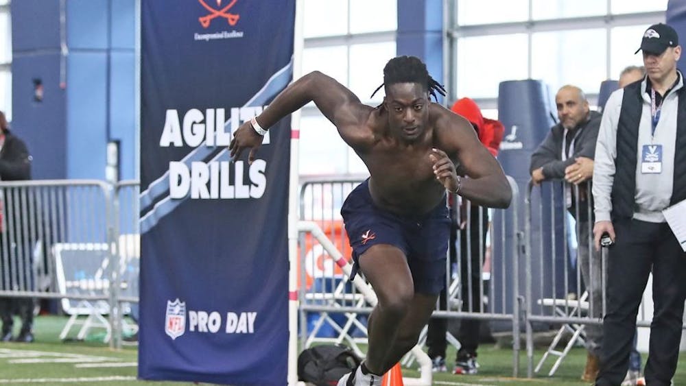 Graduate student tight end Jelani Woods put together impressive showings at the NFL Combine and Virginia Pro Day to boost his draft stock ahead of the NFL Draft.