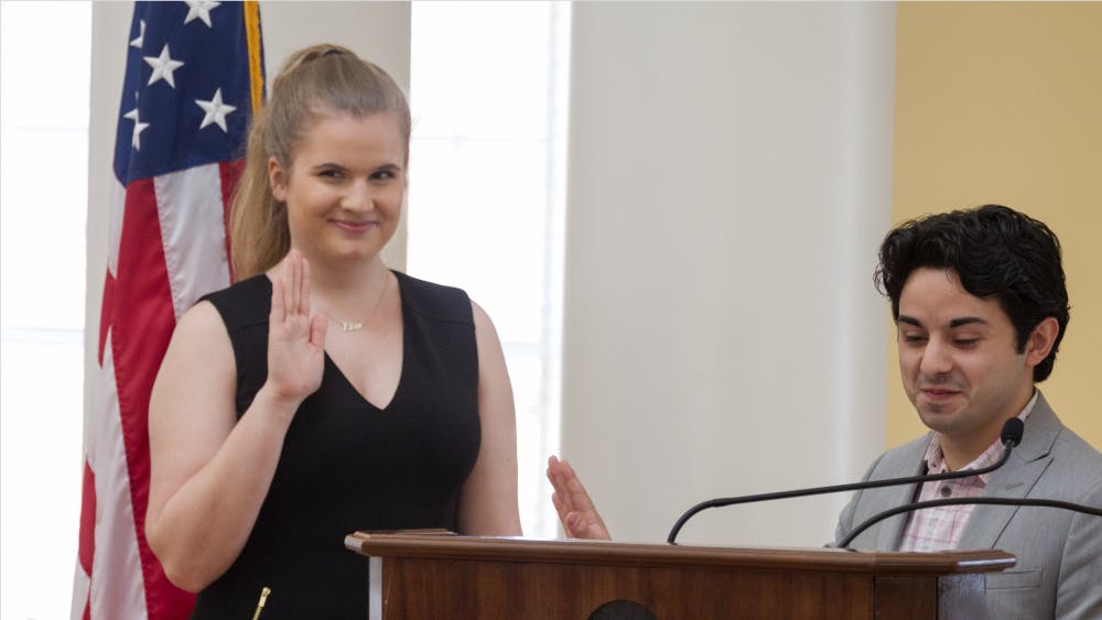 Ellie Brasacchio being sworn in by Student Council President Alex Cintron. 