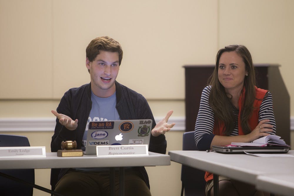 Representative Body Chair Brett Curtis addresses concerns such as course evaluations and&nbsp;mental health resources at Student Council's Tuesday meeting.
